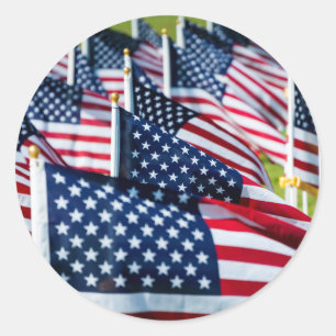 400 flags waving proudly in a field classic round sticker