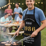 40th Birthday 1986 Name Chic Elegant Black Gold Apron<br><div class="desc">Elegant Black & Gold Chic Apron - 40th Birthday 1986 Name Personalised Kitchen & BBQ Essentials. Celebrate a fabulous birthday with style and practicality! This Elegant Black & Gold Chic Apron is the perfect accessory for the culinary enthusiast in your life. Its eye-catching design, enhanced with a touch of gold,...</div>