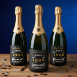 40th Birthday Legend Add Your Name 1986 Vintage Sparkling Wine Label<br><div class="desc">Born in 1986 and celebrating their 40th birthday we have the ideal sparkling wine bottle labels. The black background with a white and gold vintage typography design design is simple and yet elegant with a retro feel. Easily customize the text of this birthday label using the template provided. More gifts...</div>