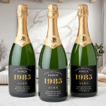 40th Birthday Name 1985 Black Gold Elegant Chic Sparkling Wine Label<br><div class="desc">Vintage Birthday Black & Gold Elegant Label. Celebrate your milestone with our exclusive sparkling wine birthday label. The meticulously designed label with stunning black and gold hues effortlessly enhances the visual appeal of your favourite sparkling wine. The year prominently featured on the label, adds a nostalgic throwback to the year...</div>