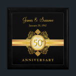 50th Anniversary Gold Black Keepsake Gift Box<br><div class="desc">Beautiful Victorian style vintage gold filigree emblem with jewel accents on black background. Just customise the names or use monogram initials, and wedding for the special Golden Anniversary couple on your gift list. Can be easily customised for other gift-giving celebrations -- holiday, birthday, retirement, graduation, or any special occasion that...</div>