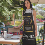 50th Birthday 1973 Name Elegant Black Gold Chic Apron<br><div class="desc">A wonderful birthday black and gold design on an apron for that special celebration. Easily customise the text using the template provided. Part of the setting standards range of birthday supplies.</div>