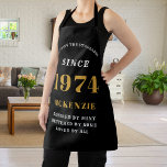 50th Birthday 1974 Name Chic Elegant Black Gold Apron<br><div class="desc">Elegant Black & Gold Chic Apron - 50th Birthday 1974 Name Personalised Kitchen & BBQ Essentials. Celebrate a fabulous birthday with style and practicality! This Elegant Black & Gold Chic Apron, personalised for those born in 1974, is the perfect accessory for the culinary enthusiast in your life. Its eye-catching design,...</div>
