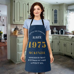 50th Birthday 1975 Name Chic Elegant Blue Gold Apron<br><div class="desc">Elegant blue & gold chic apron - 50th Birthday 1975 Name Personalised Kitchen & BBQ Essentials. Celebrate a fabulous birthday with style and practicality! This elegant chic apron is the perfect accessory for the culinary enthusiast in your life. Its eye-catching design, enhanced with a touch of class, adds a charming...</div>