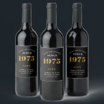 50th Birthday Name 1975 Black Gold Elegant Chic Wine Label<br><div class="desc">1975 Vintage 50th Birthday Black & Gold Elegant Wine Label. Celebrate your milestone with our exclusive birthday wine label. The meticulously designed label with stunning black and gold hues effortlessly enhances the visual appeal of your favourite wine. The year prominently featured on the label, adds a nostalgic throwback to the...</div>