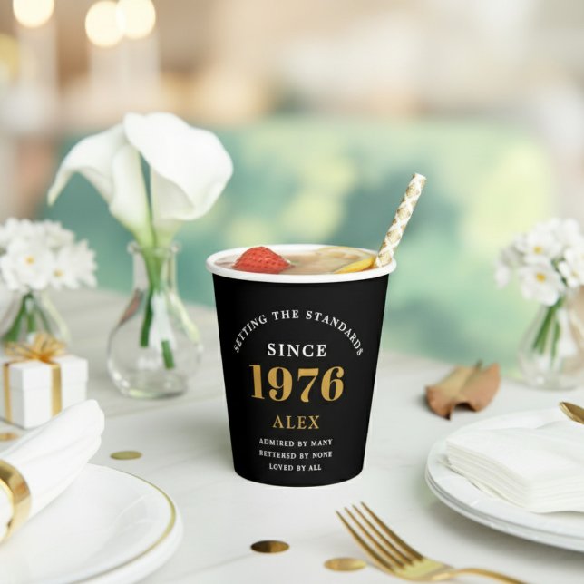 50th Birthday Name 1976 Black Gold Elegant Chic Paper Cups (1976 paper cup on a birthday party table.)