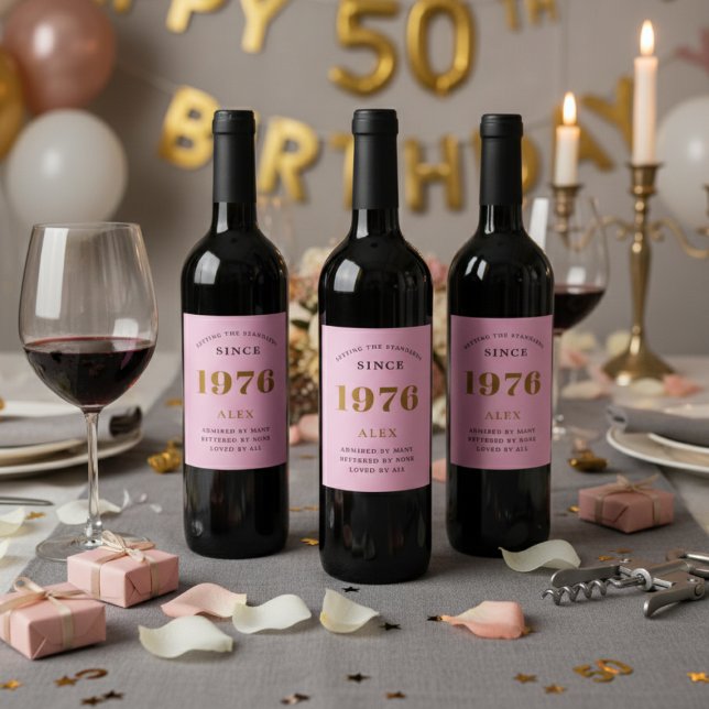 50th Birthday Name 1976 Pink Gold Elegant Chic Wine Label (50th birthday pink and gold wine bottle labels on a red wine bottles.)