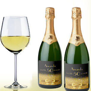 50th birthday party black and faux gold bow name sparkling wine label