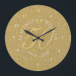 50th Wedding Anniversary Gold Dust Confetti Large Clock<br><div class="desc">50TH WEDDING ANNIVERSARY GOLD DUST CONFETTI CLOCK. Personalised with your names in white with a faux gold drop shadow and a beautiful script "50" (or a monogram initial),  on a delicate gold dust confetti background. Designed by Pure Piglet© at www.zazzle.com/purepiglet*.</div>