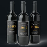 60th Birthday Name 1965 Black Gold Elegant Chic Wine Label<br><div class="desc">1965 Vintage 60th Birthday Black & Gold Elegant Wine Label. Celebrate your milestone with our exclusive birthday wine label. The meticulously designed label with stunning black and gold hues effortlessly enhances the visual appeal of your favourite wine. The year prominently featured on the label, adds a nostalgic throwback to the...</div>