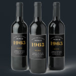 60th Birthday Name 1965 Black Gold Elegant Chic Wine Label<br><div class="desc">1965 Vintage 60th Birthday Black & Gold Elegant Wine Label. Celebrate your milestone with our exclusive birthday wine label. The meticulously designed label with stunning black and gold hues effortlessly enhances the visual appeal of your favourite wine. The year prominently featured on the label, adds a nostalgic throwback to the...</div>