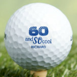 60th Gift for Father in Law – So Cool Design Golf Balls<br><div class="desc">Celebrate your amazing father in law with this stylish 60th birthday golf ball. Featuring the phrase “60 and SO COOL” in bold modern text,  it’s a fun and sporty gift he’ll love using on the course. Personalised with his name,  it's a cool keepsake for a legendary milestone. Enjoy!</div>