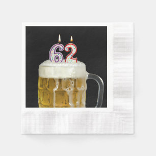 62nd birthday candles in beer napkin