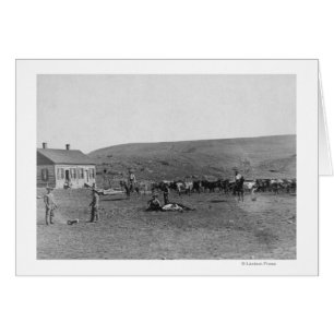 6 Cowboys Branding Cattle Near House Photograph