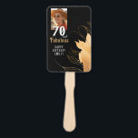 70 and Fabulous Gold Foliage 70th Birthday Photo Hand Fan<br><div class="desc">Celebrate a monumental 70th birthday in style with this elegant '70 & Fabulous' personalized hand fan. Featuring a stunning black background adorned with luxurious gold floral outlines, this design is perfect for marking such a special milestone. Customize it with the birthday person's photo and name for a truly unique touch....</div>