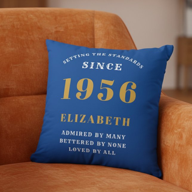 70th Birthday 1956 Add Name Blue Gold Personalized Cushion (1956 Throw pillow on an orange chair.)
