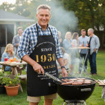 70th Birthday 1956 Name Chic Elegant Black Gold Apron<br><div class="desc">Elegant Black & Gold Chic Apron - 70th Birthday 1956 Name Personalised Kitchen & BBQ Essentials. Celebrate a fabulous birthday with style and practicality! This Elegant Black & Gold Chic Apron, personalised for those born in 1956, is the perfect accessory for the culinary enthusiast in your life. Its eye-catching design,...</div>