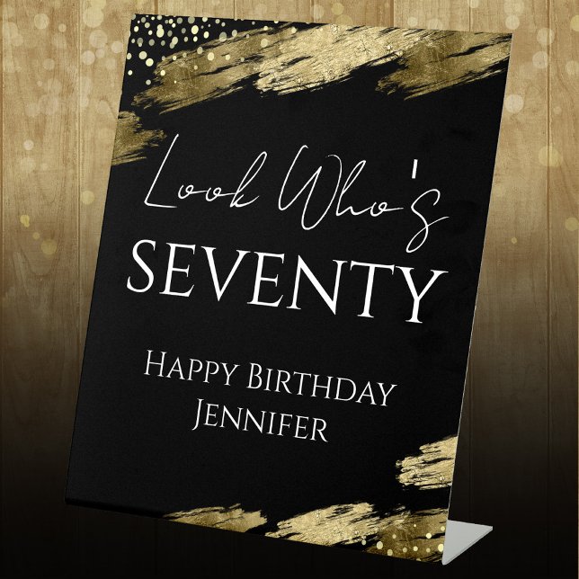 70th Birthday Look Who Gold Black Pedestal Sign (Creator Uploaded)
