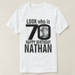 70th birthday mono look 70 custom photo and name T-Shirt<br><div class="desc">70th birthday mono, look who is 70 custom photo and name t-shirt. Fun 70th personalised photo black and white birthday tee design. Personalise this birthday shirt with a photograph of the birthday boy or girl in the middle of the number 0. Great idea for adding some fun to a milestone...</div>