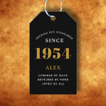 70th Birthday Name 1954 Black Gold Elegant Chic Gift Tags<br><div class="desc">Elegant Chic 1954 Black Gold Personalised 70th Birthday Gift Tags. Celebrate the milestone birthday with our Elegant Chic 1954 Black Gold Personalised 70th Birthday Gift Tags. Each gift tag is meticulously designed with a black and gold colour scheme that oozes elegance. Fully personalised to add that exclusive touch, these gift...</div>