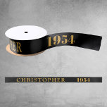 70th Birthday Name 1954 Black Gold Elegant Chic Satin Ribbon<br><div class="desc">70th Birthday Black Gold Elegant Chic Satin Ribbon Born 1954 - Personalised Celebration Accessory. Be a showstopper at your birthday bash with our 70th Birthday Name 1954 Black Gold Elegant Chic Satin Ribbon! Embellished with stunning black and gold, this satin ribbon speaks volumes of your unique style and sophisticated taste....</div>