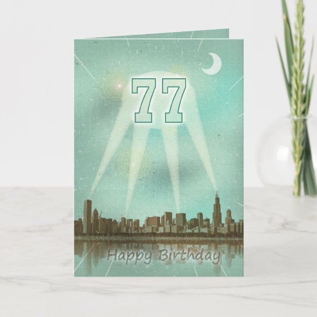 77th Birthday card with a city and spotlights (Front)