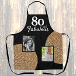 80 and Fabulous Gold Glitter 2 Photo 80th Birthday Apron<br><div class="desc">80 and Fabulous Gold Glitter 2 Photo 80th Birthday Apron. Faux gold glitter on black with 2 photos - you can use old and new photos. Add your age,  and make a personalised birthday gift for a woman's milestone celebration.</div>