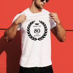 80 So what Funny Laurel Wreath Crown 80th Birthday T-Shirt<br><div class="desc">80 So what Funny Laurel Wreath Crown 80th Birthday T-Shirt. A funny quote I`m 80 so what in modern bold fonts and black colour. The design has a a laurel wreath around the words and a crown above the custom name. Add your name. Perfect gift for a man with a...</div>