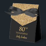 80th Birthday Black Gold Glitter Thank You Favour Box<br><div class="desc">This fabulous modern 80th Birthday Black Gold Glitter Thank You favour box with sparkling gold glitter, the birthday girl's name in a trendy script font, and tied with an elegant black bow would be perfect for your event. It would be great for a candy station, on a thank you gift...</div>
