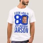 80th birthday blue look 80 custom photo name T-Shirt<br><div class="desc">80th birthday blue and white, look who is 80 custom photo and name t-shirt. Fun 80th personalised photo royal bright blue and white birthday tee design. Personalise this birthday shirt with a photograph of the birthday boy or girl in the middle of the number 0. Great idea for adding some...</div>