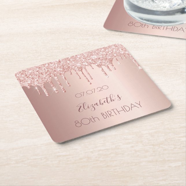 80th birthday blush rose gold glitter drips name square paper coaster (Angled)