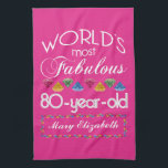 80th Birthday Most Fabulous Colourful Gems Pink Tea Towel<br><div class="desc">Celebrate the milestone birthday of your favourite senior citizen with this fun gift reminding them of how fabulous they are. White and grey lettering on deep pink background. Colourful diamond-cut gems in rainbow tones serve as accent. Customise with names, initials or other text. This series is in increments of 5...</div>