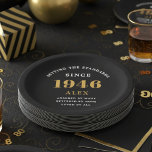 80th Birthday Name 1944 Black Gold Elegant Chic Paper Plate<br><div class="desc">Sophisticated 80th Birthday Unique Black & Gold Party Paper Plates. Celebrating a milestone birthday should be a memorable experience, and what better way to ensure that than with our sophisticated black and gold 80th Birthday Party Paper Plates? Designed in sleek black with an elegant gold highlight, these plates are printed...</div>