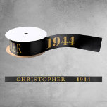 80th Birthday Name 1944 Black Gold Elegant Chic Satin Ribbon<br><div class="desc">80th Birthday Black Gold Elegant Chic Satin Ribbon Born 1944 - Personalised Celebration Accessory. Be a showstopper at your birthday bash with our 80th Birthday Name 1944 Black Gold Elegant Chic Satin Ribbon! Embellished with stunning black and gold, this satin ribbon speaks volumes of your unique style and sophisticated taste....</div>