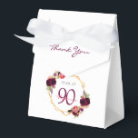 90th Birthday burgundy gold geometric floral white Favour Box<br><div class="desc">Elegant and glamourous for a 90th birthday party. On front flap: burgundy letters and the text: Thank You. Front and back: A chic white background with a faux gold geometric frame. Decorated with dark purple and burgundy flowers, roses and boho style feathers. The name is written with pink hand lettered...</div>