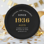 90th Birthday Name 1936 Black Gold Elegant Chic Paper Plate<br><div class="desc">Sophisticated 90th Birthday Unique Black & Gold Party Paper Plates. Celebrating a milestone birthday should be a memorable experience, and what better way to ensure that than with our sophisticated black and gold 90th Birthday Party Paper Plates? Designed in sleek black with an elegant gold highlight, these plates are printed...</div>