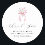 90th Birthday Party Bow Custom Thank You Favour Classic Round Sticker<br><div class="desc">Thank your guests for coming to your birthday party with this personalised thank you favour sticker.  It features a blush pink coquette bow accented with pink and blue wildflowers. Thank you is written in a lovely open script. Three lines let you customise your appreciation. All text is editable.</div>