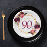 90th birthday party white gold geo floral burgundy paper plate<br><div class="desc">A plate for a 90th birthday party. A chic white background with a faux gold geometric frame. Decorated with dark purple and burgundy flowers, roses and boho style feathers. Templates for a name, age 90 and a date. Date of birth or the date of the party. The name is written...</div>