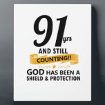 91 years and still counting birthday plaque<br><div class="desc">91 years and still counting God has been a Shield and protection will make a cool birthday gift</div>