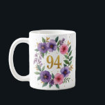 94th Birthday Mug – Floral Wreath with Gold Number<br><div class="desc">Celebrate 94 beautiful years with this elegant floral birthday mug! Featuring a stunning watercolor wreath of pink and violet flowers, lush green leaves, and a golden "94" at the centre, this mug makes a perfect gift for any grandmother, mother, aunt, or friend turning 94. Delicate yet vibrant, it’s ideal for...</div>