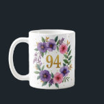 94th Birthday Mug – Floral Wreath with Gold Number<br><div class="desc">Celebrate 94 beautiful years with this elegant floral birthday mug! Featuring a stunning watercolor wreath of pink and violet flowers, lush green leaves, and a golden "94" at the centre, this mug makes a perfect gift for any grandmother, mother, aunt, or friend turning 94. Delicate yet vibrant, it’s ideal for...</div>