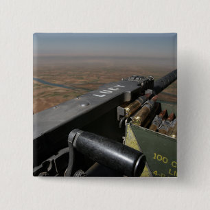 A 50 calibre machine gun 15 cm square badge