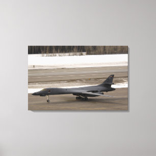A B-1B Lancer performs a touch and go Canvas Print