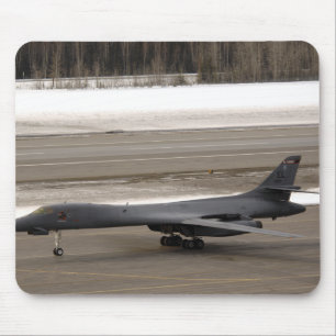 A B-1B Lancer performs a touch and go Mouse Mat