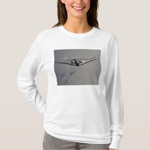 A B-2 Spirit flies over the Pacific Ocean T-Shirt
