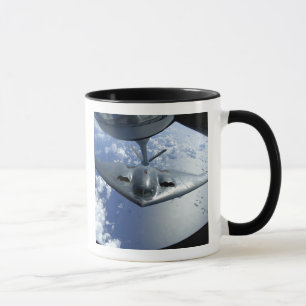 A B-2 Spirit moves into position for refueling Mug