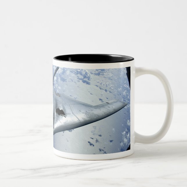 A B-2 Spirit moves into position for refueling Two-Tone Coffee Mug (Right)