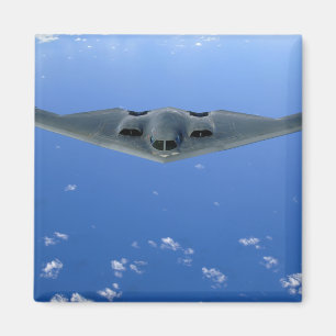 A B-2 Spirit soars through the sky Magnet