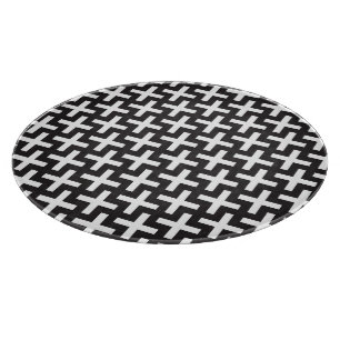 A b&w patterns made with 'plus' sign cutting board