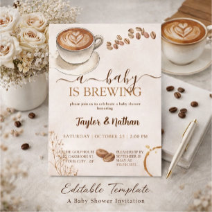 a baby prepares a baby shower invitation